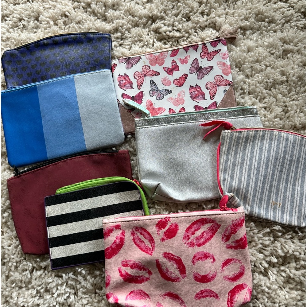 Multiple assortment bundle of cute, small coin, or make up bags.